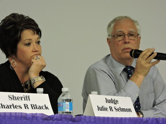 T-L Photos/JANELL HUNTER Monroe County Common Pleas Judge Julie R. Selmon and County Judge Clifford N. Sickler share their perspectives on how the opioid epidemic is affecting the local community.